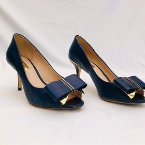 Louise et Cie leather pumps with gold accent bow